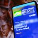 Governo libera saque do auxílio emergencial para 2,5 milhões